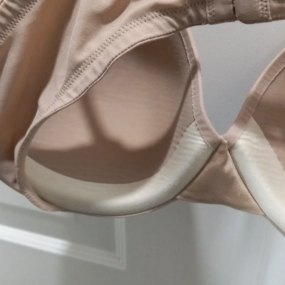 2 Padded Bras Size 34 D One Black/ one Beige